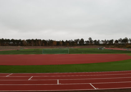 Kuvituskuva, jossa on yleisurheilukenttä.