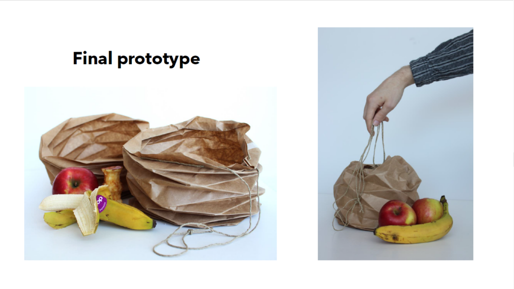 Foldable biowaste bag made from paper alongside banana and apples