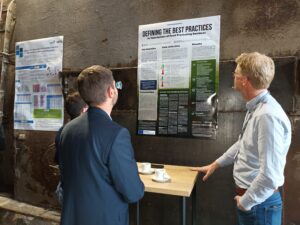 People are looking at the poster.